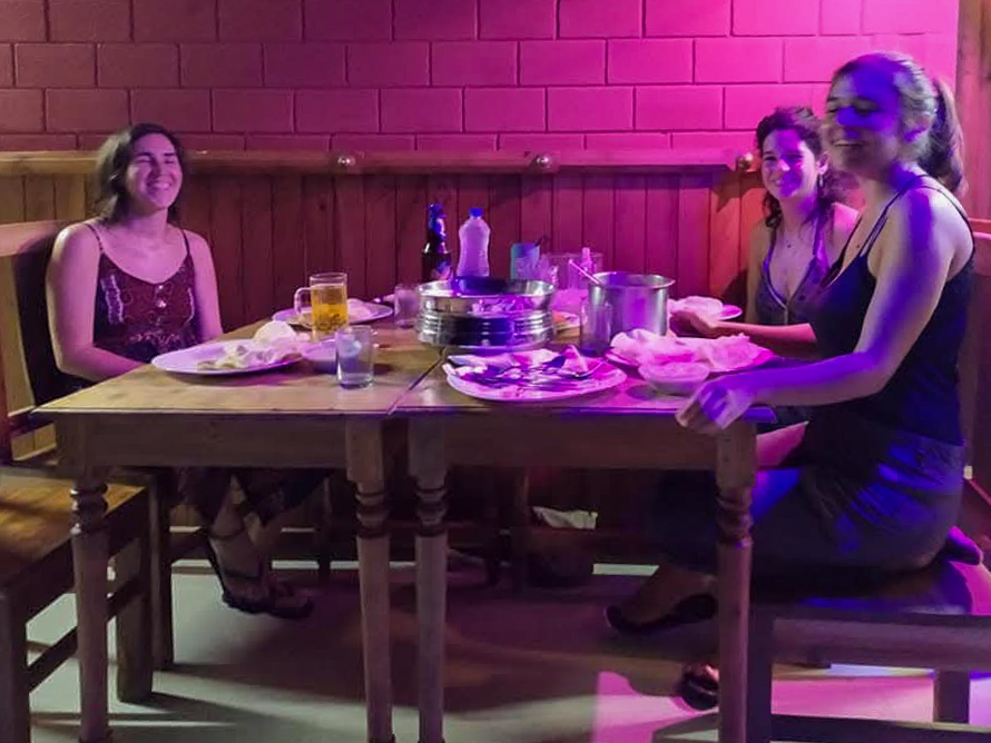 Happy guest enjoying backwater homestay experience at Mundro's Haven's Munroe Island